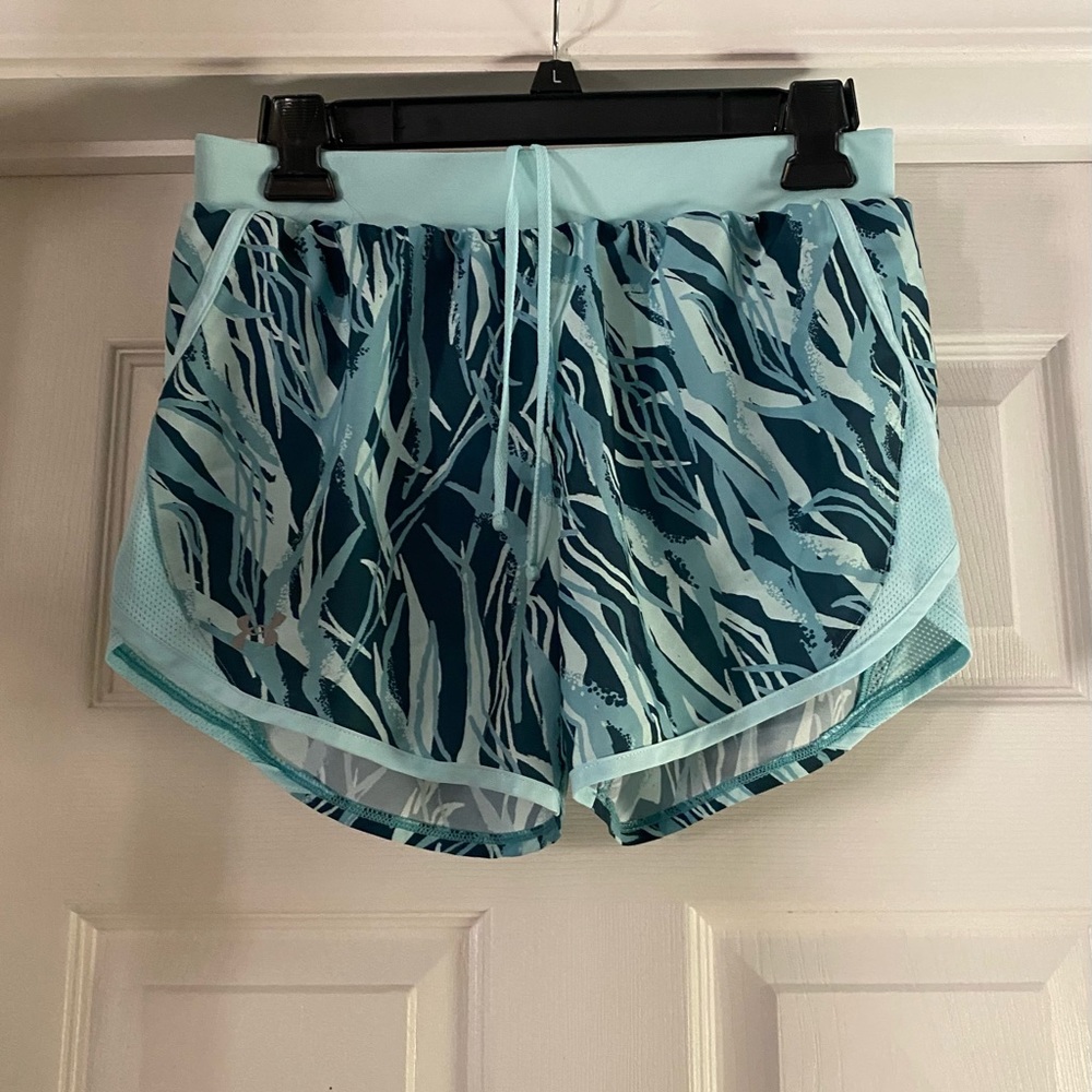 Under Armour athletic shorts are a size Small P.